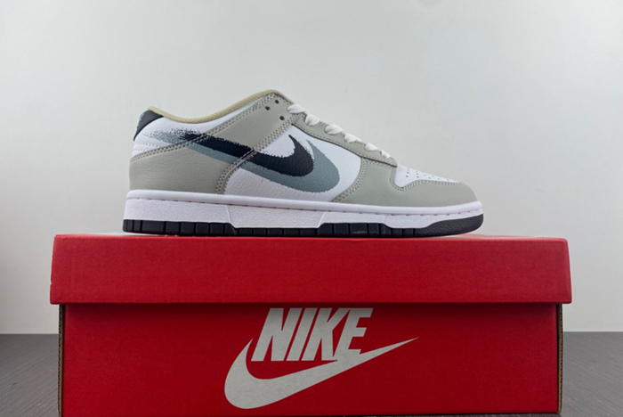 NIKE DUNK LOW “STENCIL SWOOSH”  FD0661-100